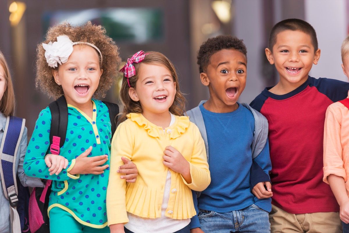 group of little children laughing at funny knock knock jokes for kids