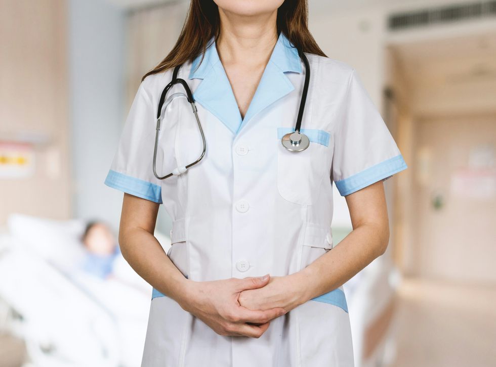 a doctor prepares for a routine checkup with a patient