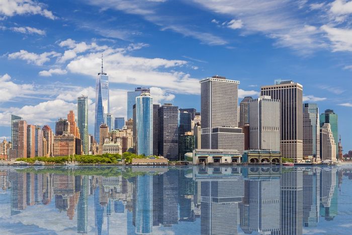 city skyline of and Water of New York Harbor in New York, NY