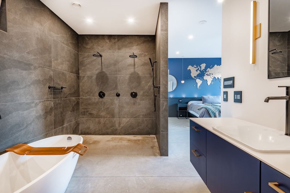 fancy bathroom with an open shower