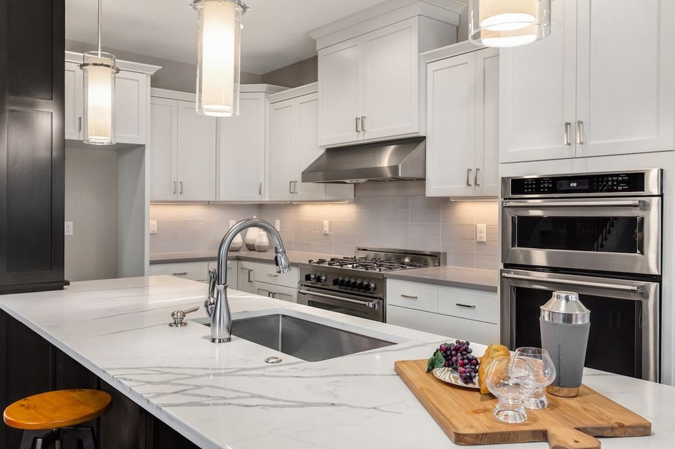 large modern kitchen island with a sink