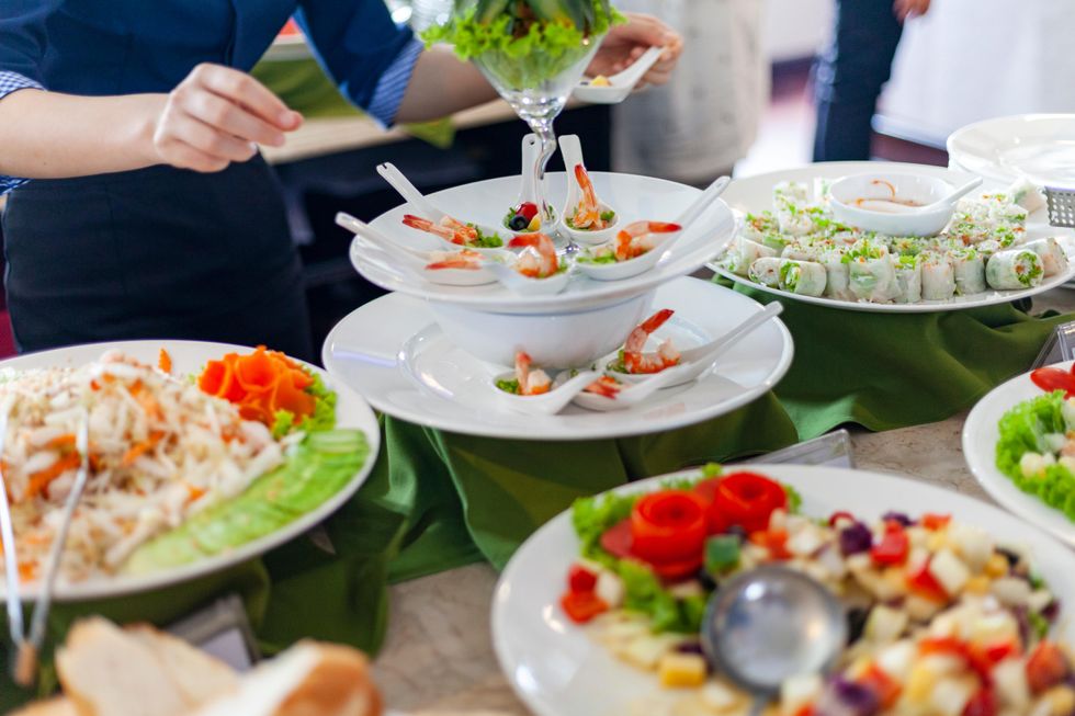 Many plates of food on a cruise