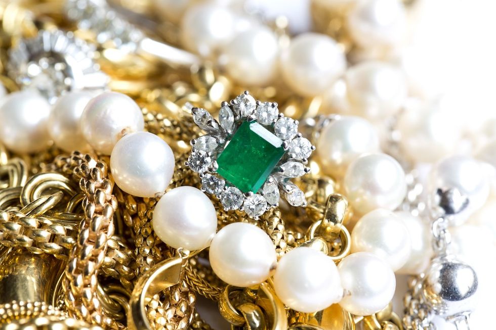 pile of jewelry and emerald