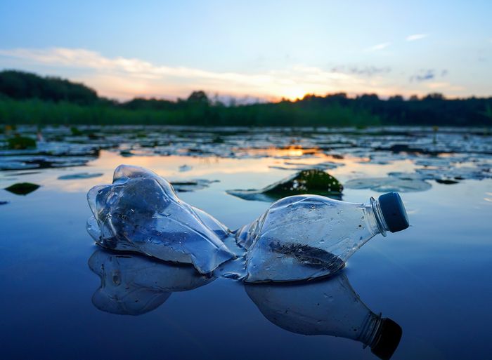 Plastic waste floating in a lake