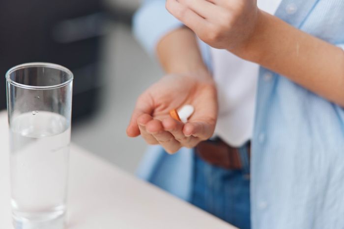 woman taking supplements