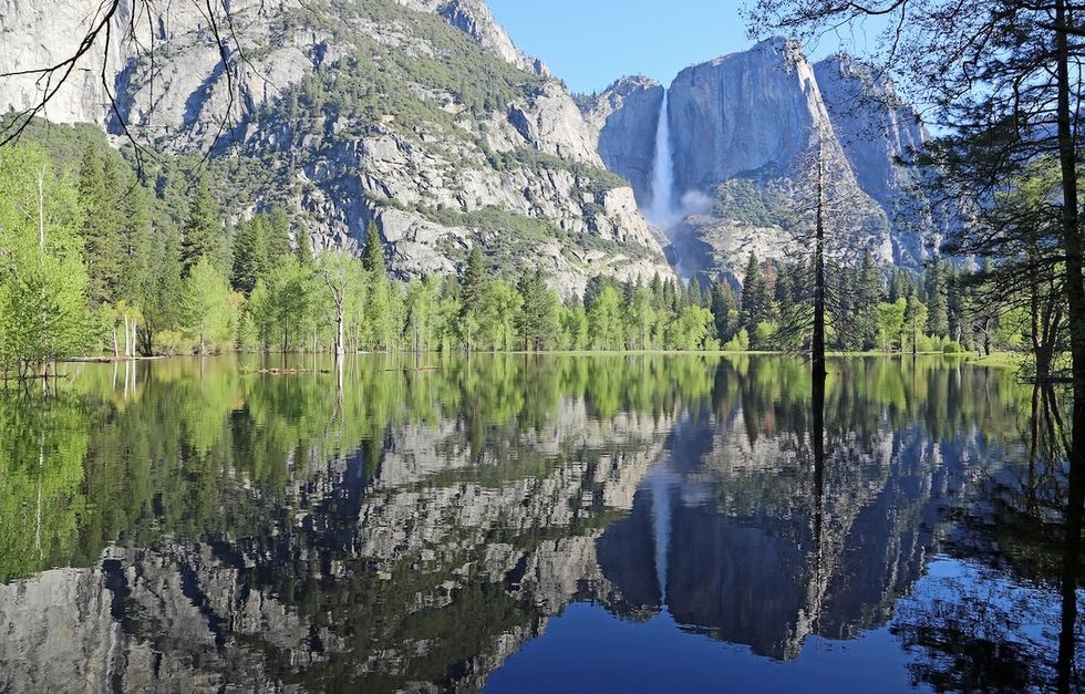 Yosemite Falls reflected in a lake