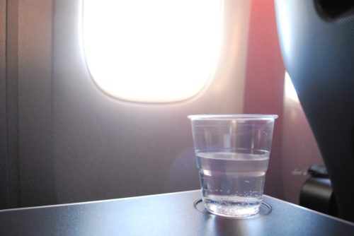 drinking water on airplane business travel