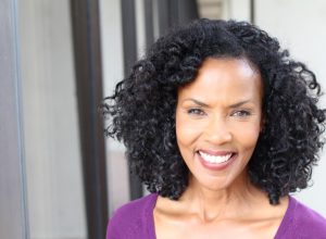 older woman smiling, look better after 40