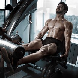 Man feeling the burn and swearing at gym