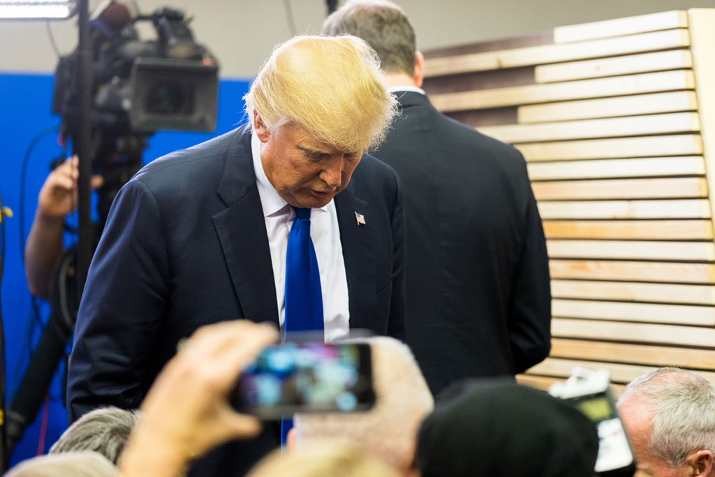 President Donald Trump with Head Hanging