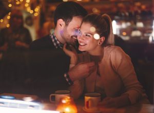 Couple Flirting in Restaurant