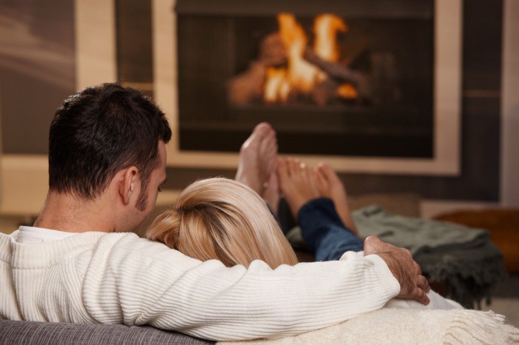 Couple in Front of Fireplace Wordplay Jokes