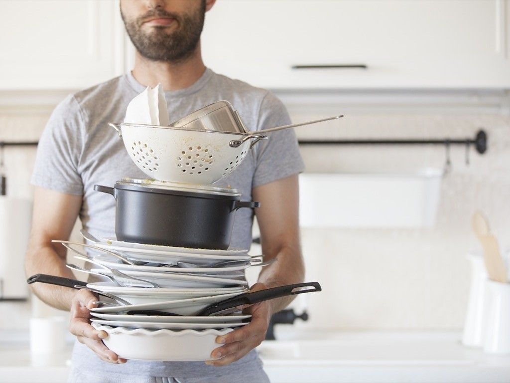 Husband doing dishes