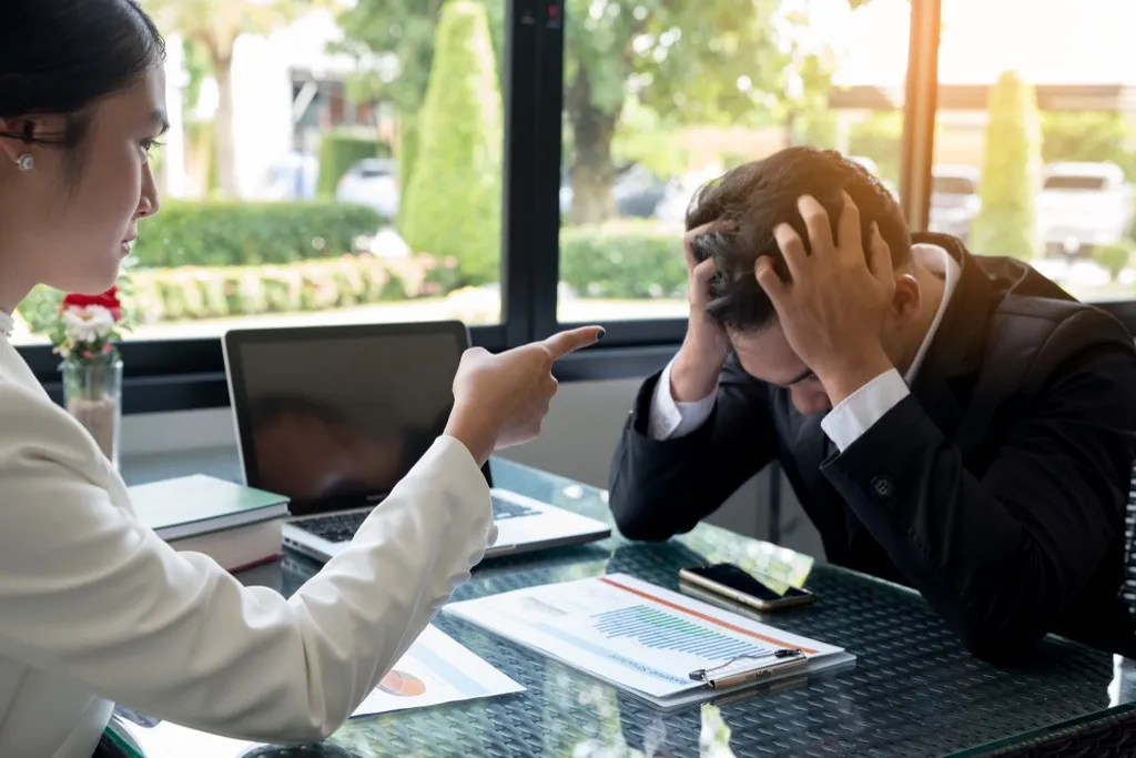 Man Getting Yelled at at Work Signs of Burnout