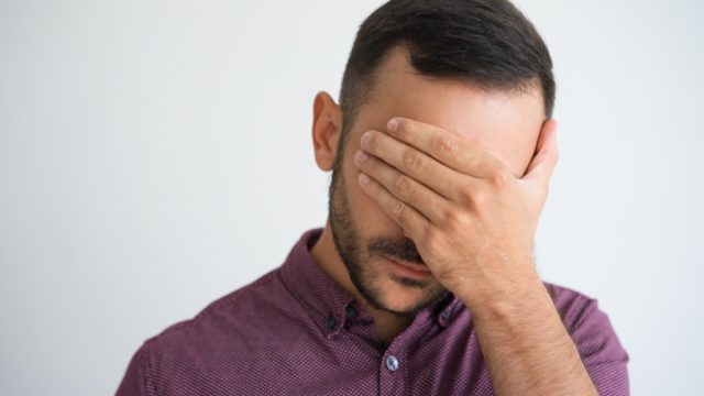 Man over 40 Looking frustrated