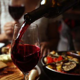 red wine being poured into glass, reduce alzheimers risk