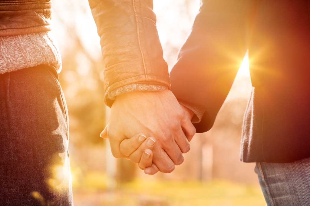 Couple, holding hands, sunset, fall, Bad Dating Marriage Tips 