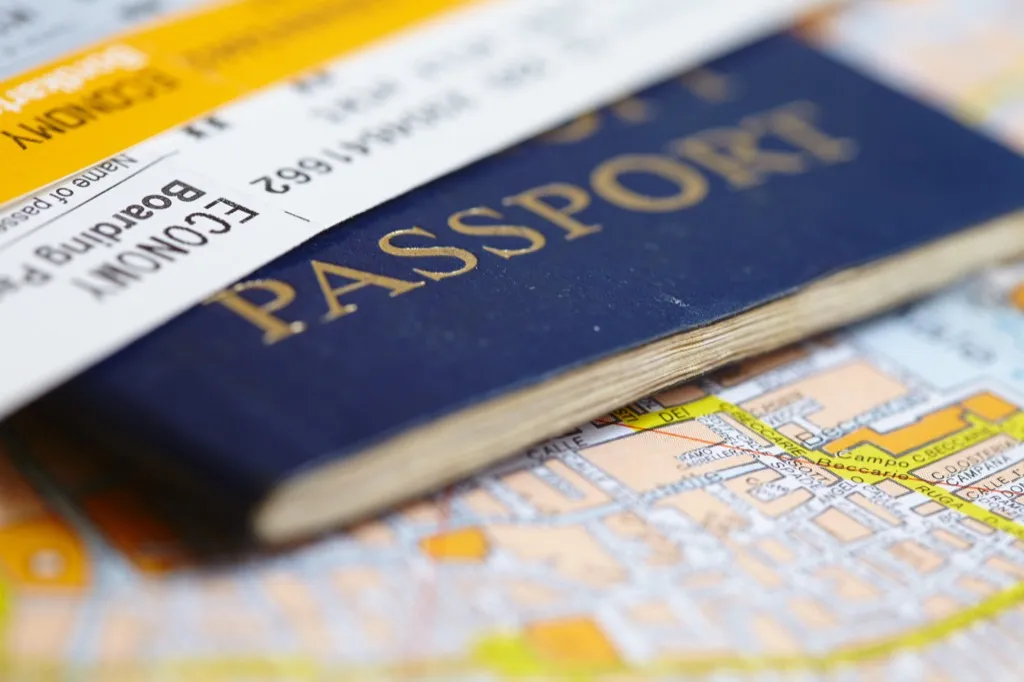 passport and plane tickets, empty nest