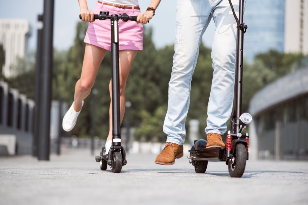 Couple on Scooters Things No One Over 40 Should Do