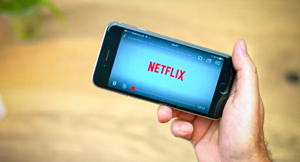 Person watching Netflix on a phone