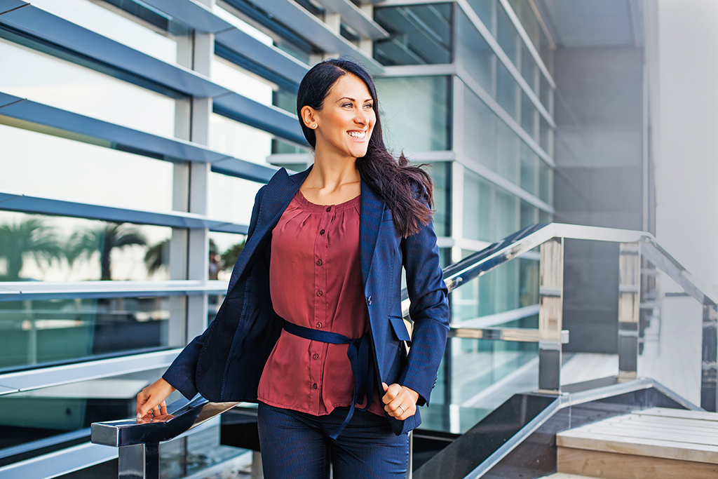 woman in business clothes ways to get a promotion after 40