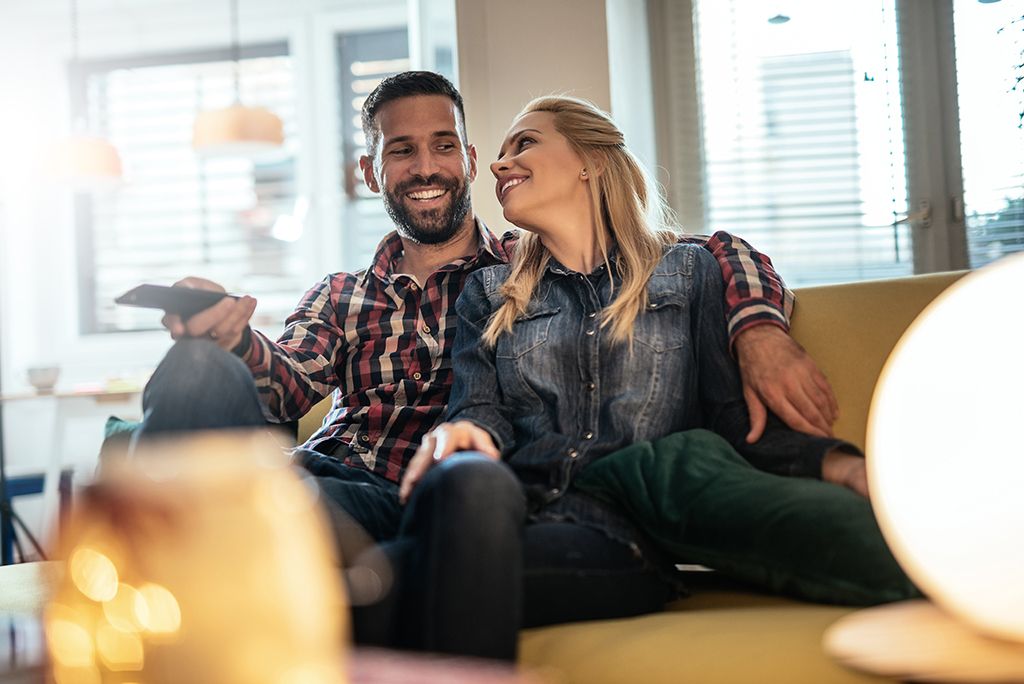 couple watching tv at home life changes after marriage