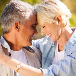 healthy older couple in embrace