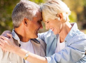 healthy older couple in embrace