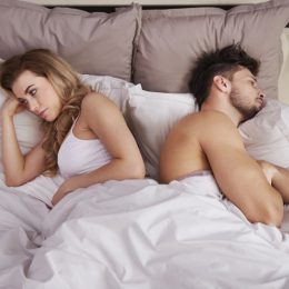 couple angry in bed