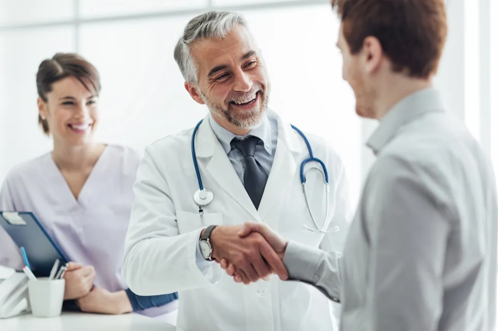 doctor shaking hands with patient advice you should ignore over 40