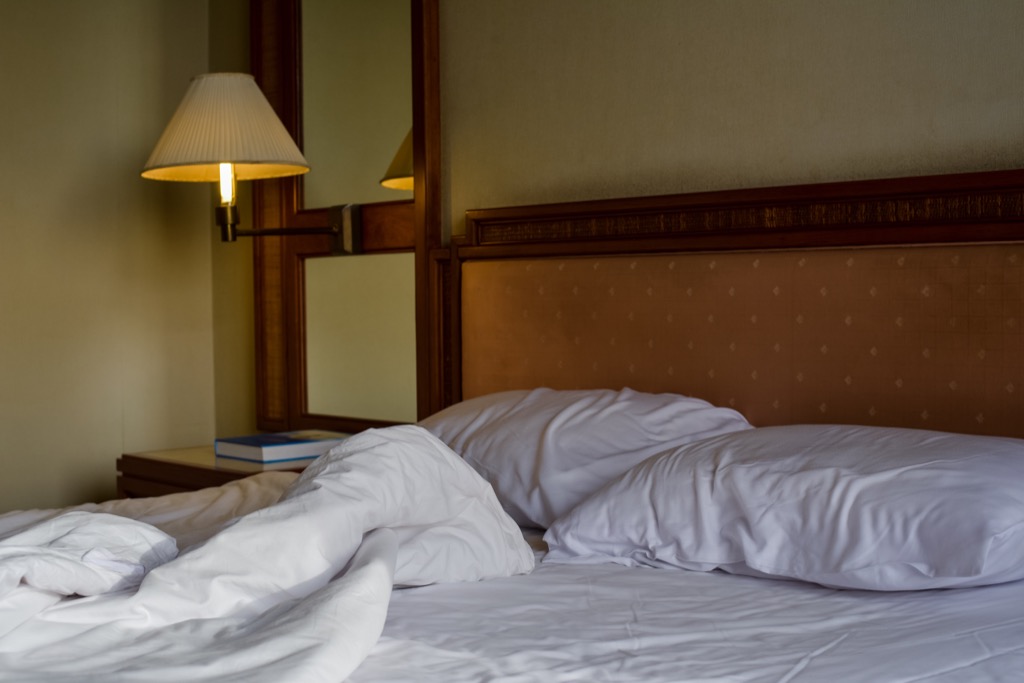 Unmade hotel bed housekeeper secrets