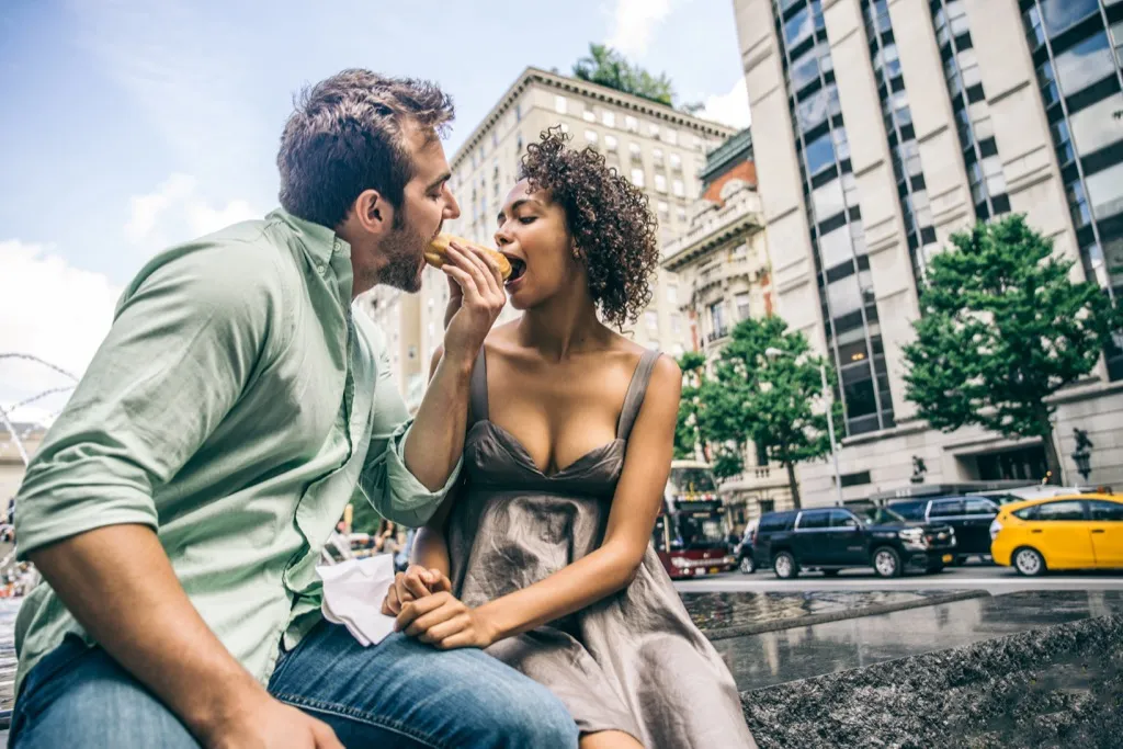 couple eating hot dog partner Fake American Traditions
