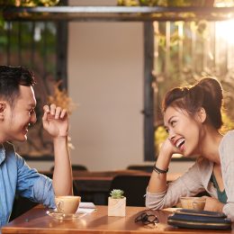 couple laughing at restaurant, f
