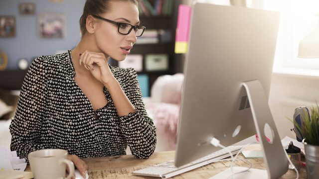 woman working on computer, working mom