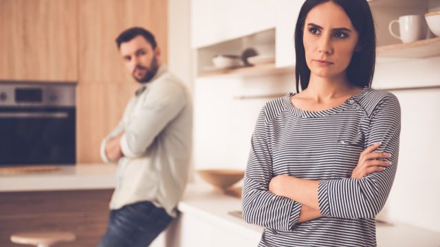 Couple fighting in kitchen