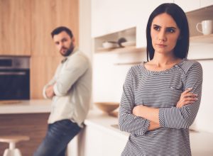 Couple fighting in kitchen