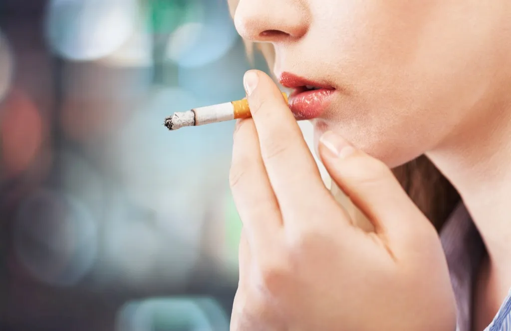 Woman Smoking Habits That Increase Flu Risk