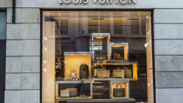 Louis Vuitton store front, representing designer names.