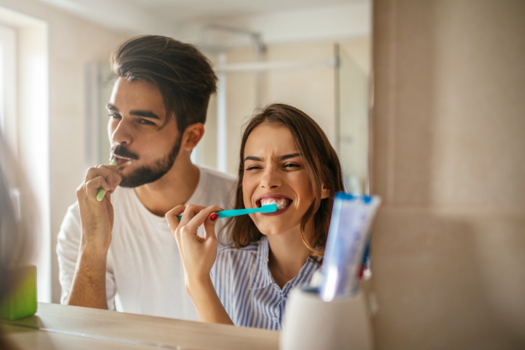 couple brushing teeth stay sharp, teeth