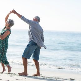 elderly couple on beach marriage last forever