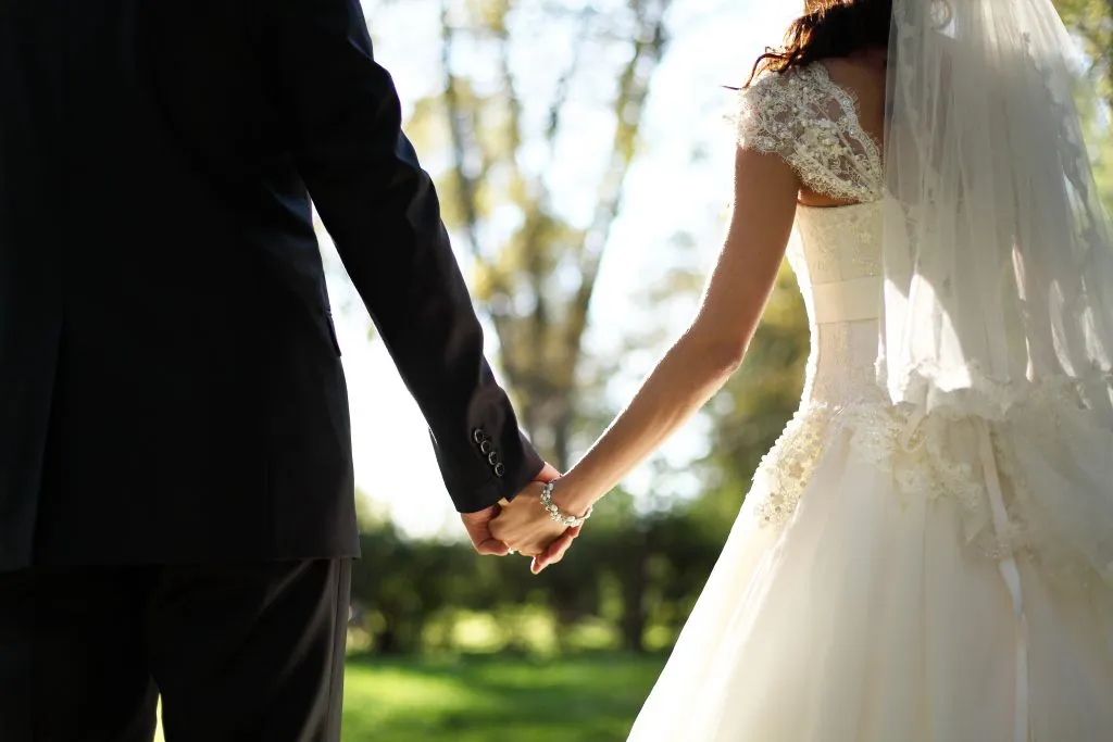 Bride and groom at wedding divorce at 40