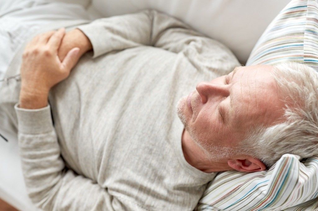 man sleeping couch