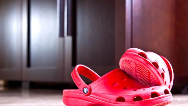 Red crocs on floor