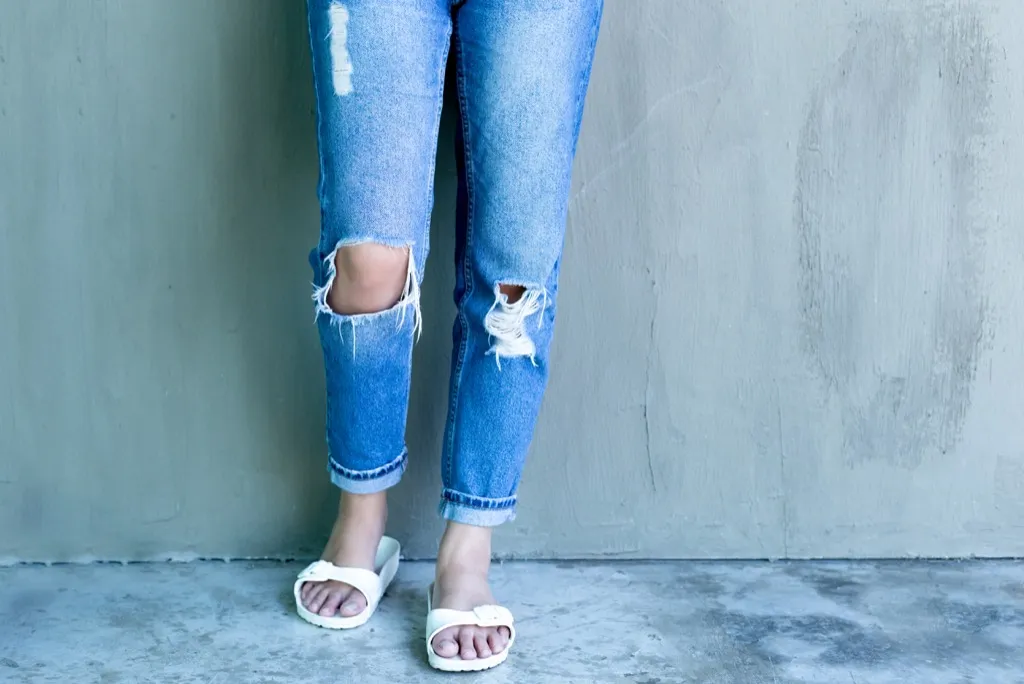 ripped denim jeans things no woman over 50 should own