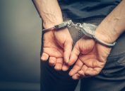 man's hands behind back in handcuffs, things you should never lie to kids about