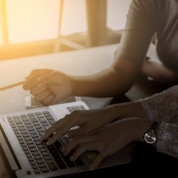 Entrepreneurs working on a laptop