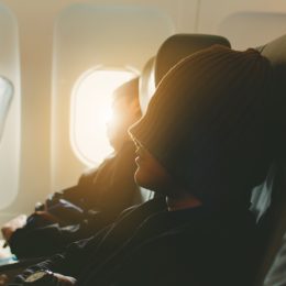 People sleeping on an airplane.