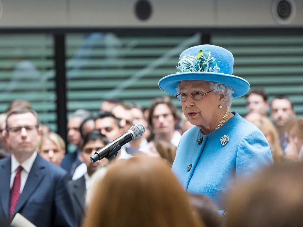 Queen Elizabeth wears brightly colored hats