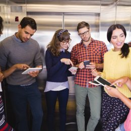 crowded group of people in elevator