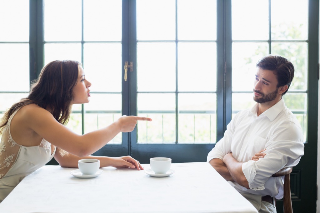 woman pointing at man across the table fighting, things divorced people know